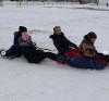 Деревянная горка уже встретила первых посетителей. Сколько радости, удовольствия и восторга на лицах довольных ребятишек